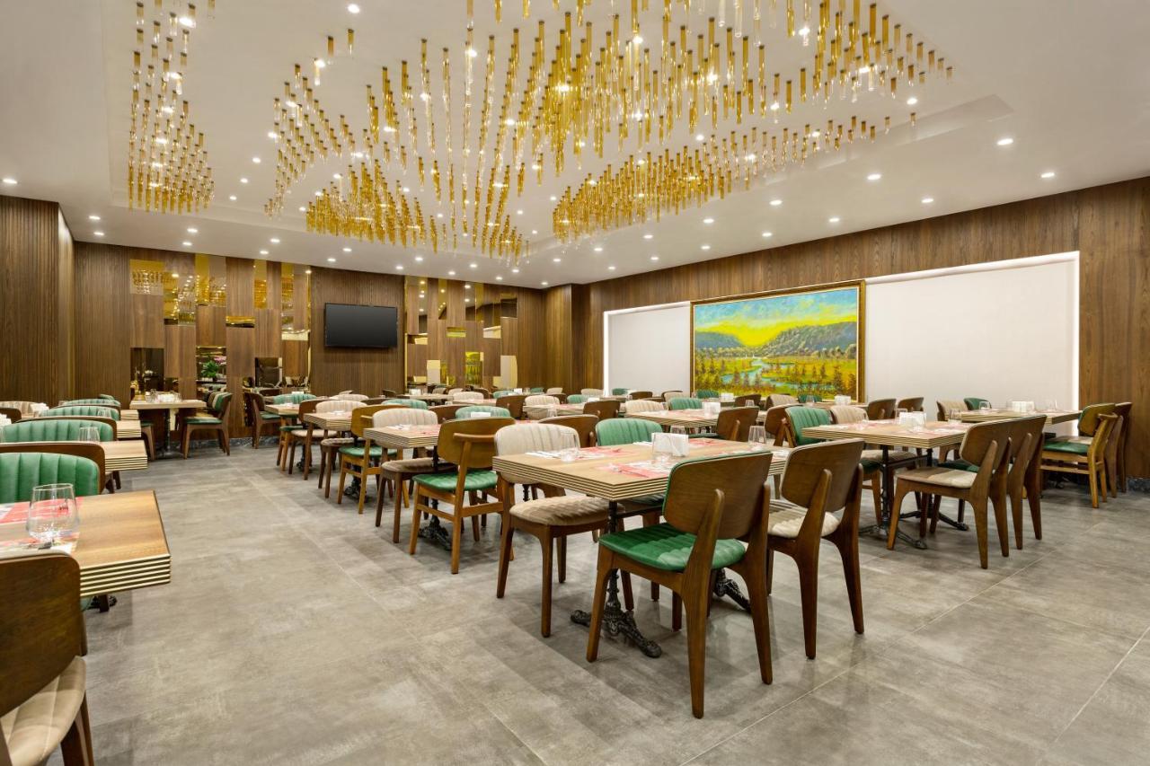 Hotel Ramada By Wyndham Istanbul Umraniye Esterno foto