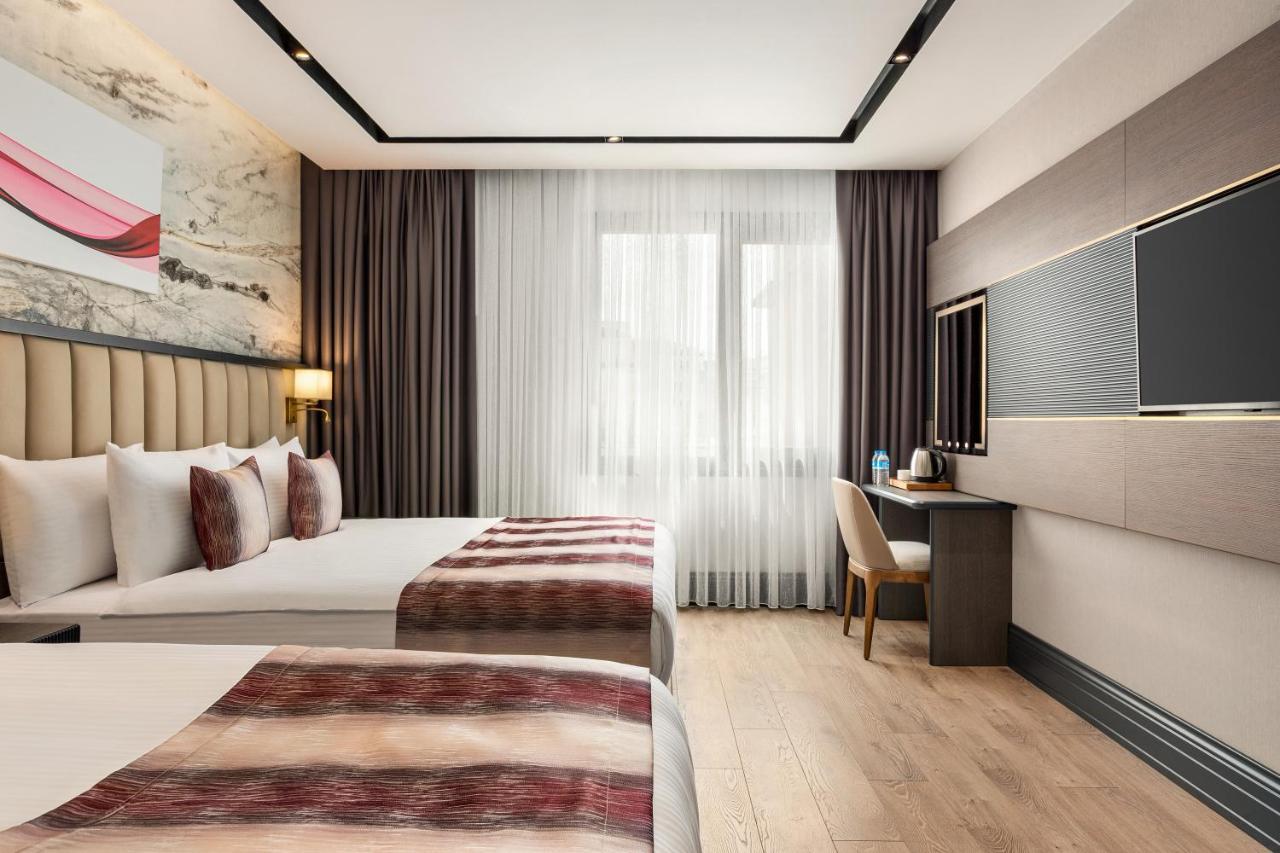 Hotel Ramada By Wyndham Istanbul Umraniye Esterno foto