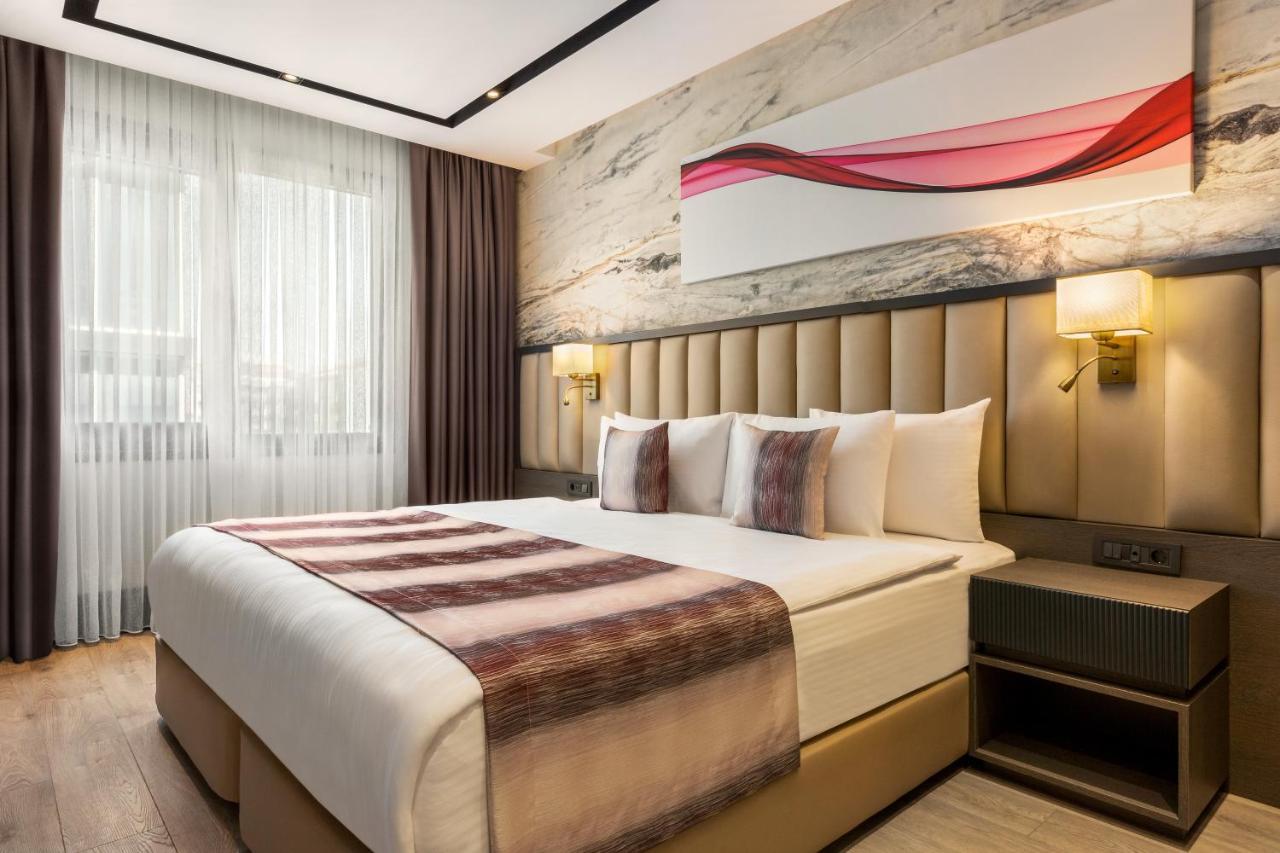 Hotel Ramada By Wyndham Istanbul Umraniye Esterno foto